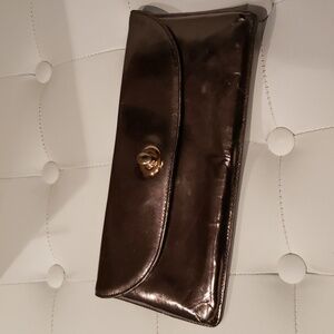 Hobo bronze metallic leather clutch